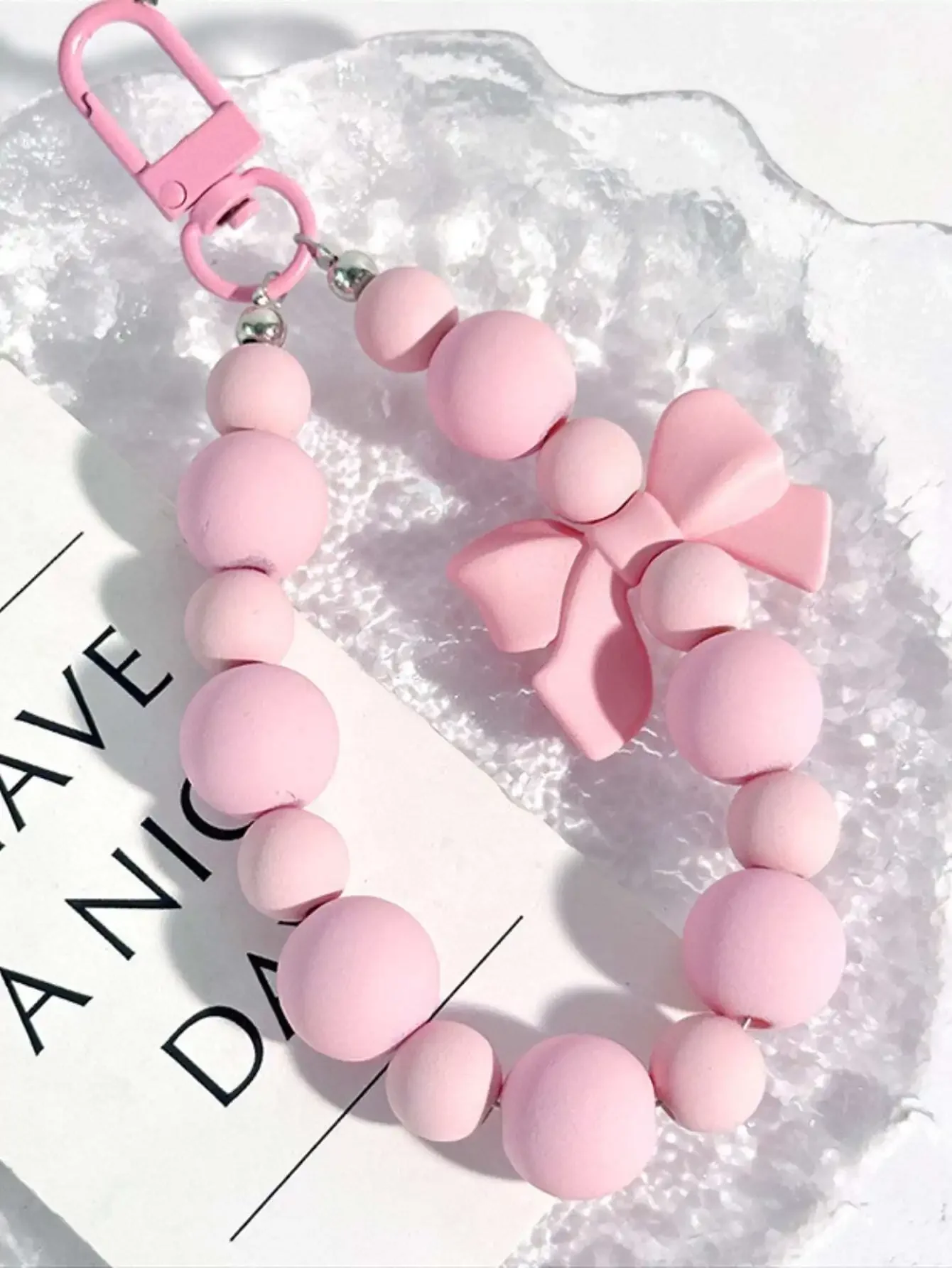 1pc Pink Pearl Bow Keychain Mo - Phone Accessories For Teens recension och pris